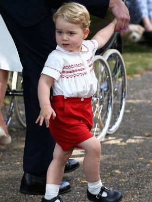 Prince George in his red-and-white tribute outfit at her sisters christening - 2015.jpg